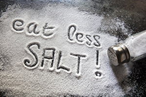 table salt with eat less salt! written in it