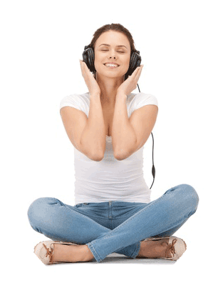 Woman listening to RMF Technique sitting in Yoga position with headphones on