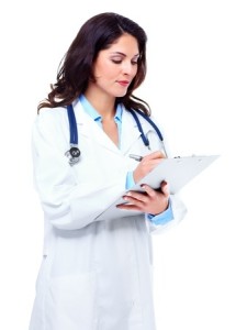 Female doctor at CHC with stethoscope and clipboard