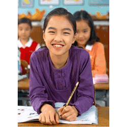 Young smiling girl in class dressed in purple