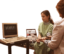 photo of chiropractic assistant performing EMI evaluation test