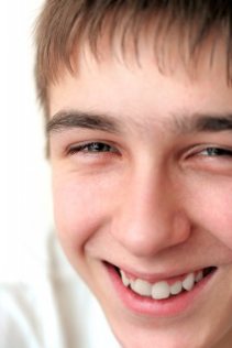 Smiling happy teenage boy
