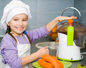 Young girl making juice