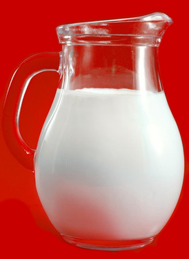 Photo of a picture of pasteurized milk on a red background