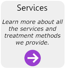 Gray button with the purple arrow to learn more about services that are offered at Cherubino Health Center