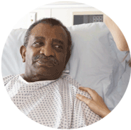 Photo of a man in bed after he had a stroke TIA