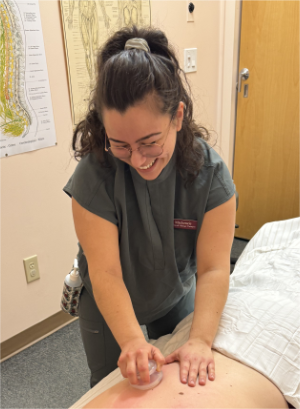 Mackenzie Shibel L.M.T. Cupping, full color Image at Cherubino Health Center